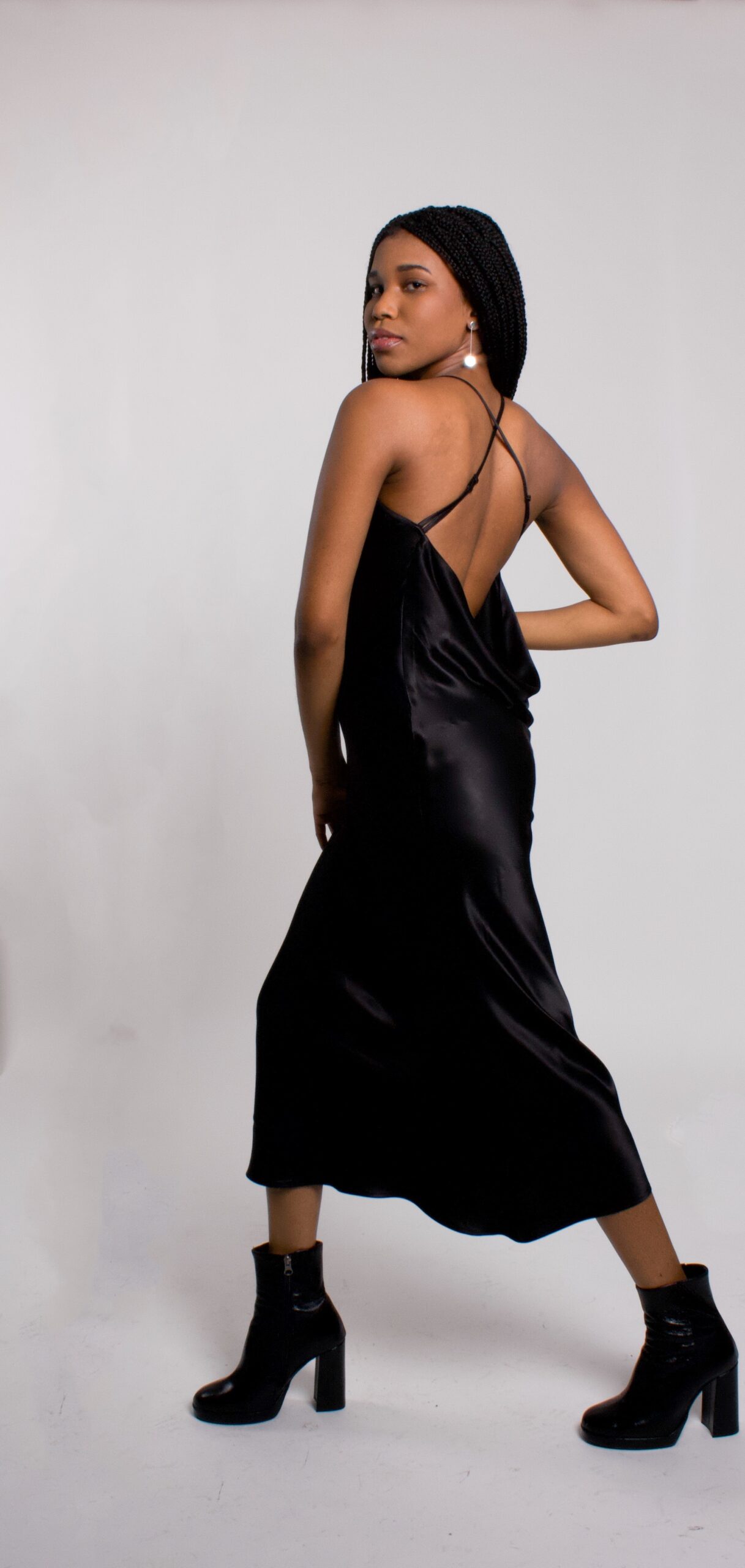 Black satin draped back dress