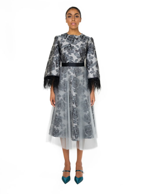 This Brocade Midi dress has a tulle over layer and feather detail on the sleeves