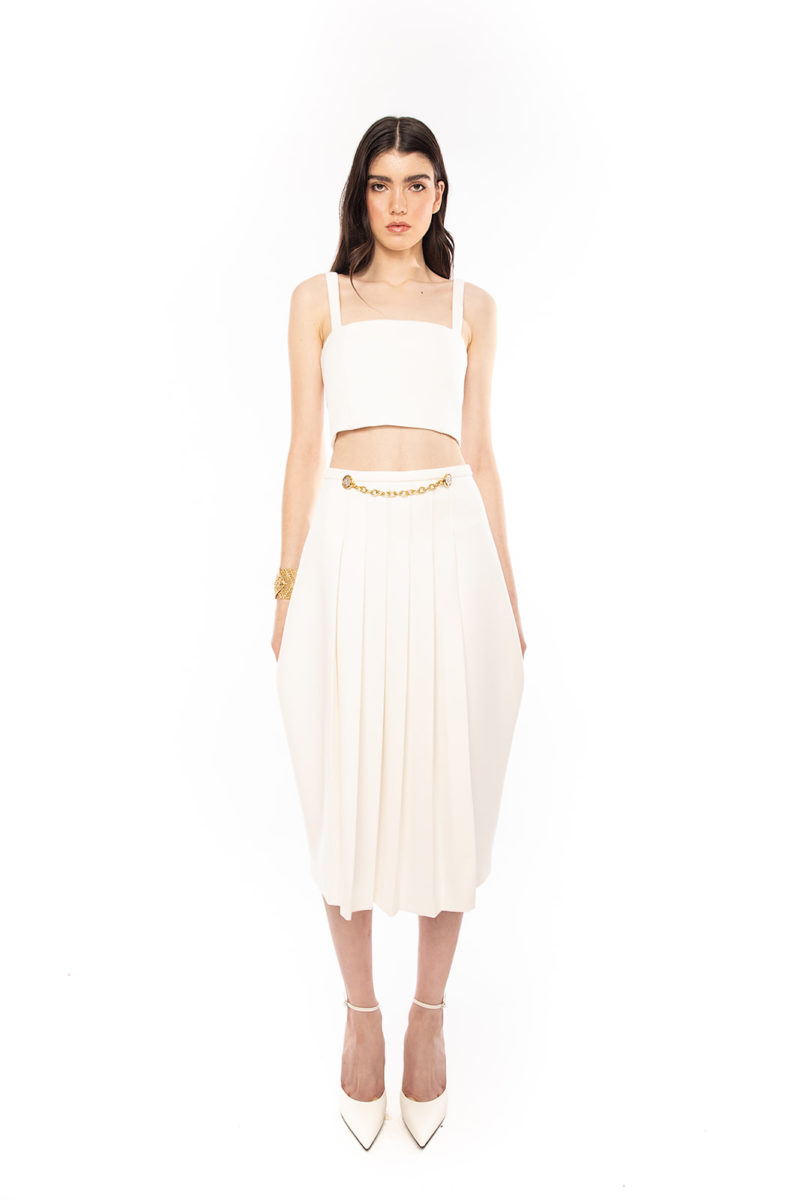 crepe skirt with pleated detail and gold chain