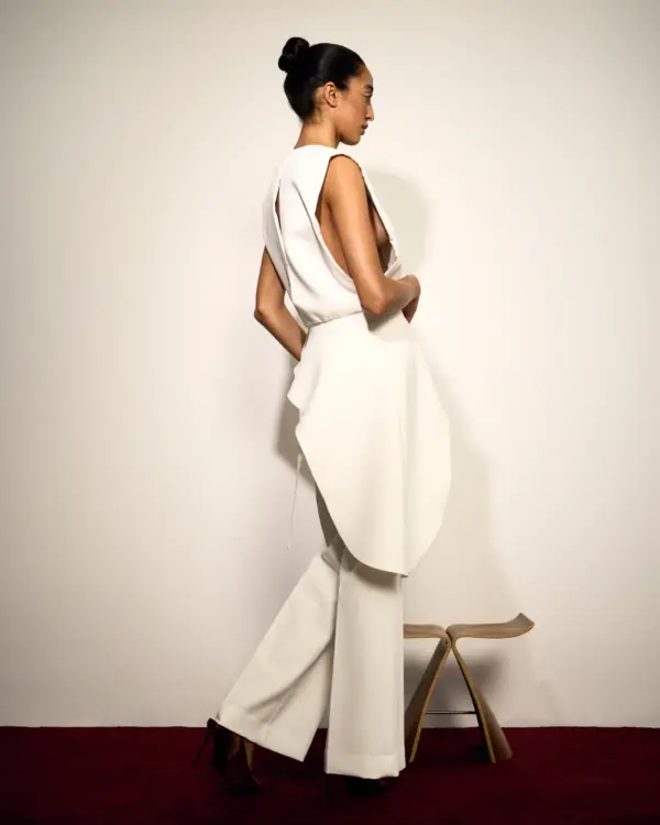 Ivory peplum top straight leg pants